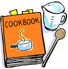 Cookbook with a spoon and measuring cup on an orange background