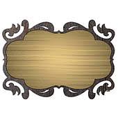 Decorative gold frame with intricate black designs on a white background